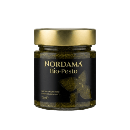 Nordama Bio-Pesto jar with black label and gold lid on a white background